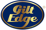 Gilt edge written in gold on a dark blue oval background